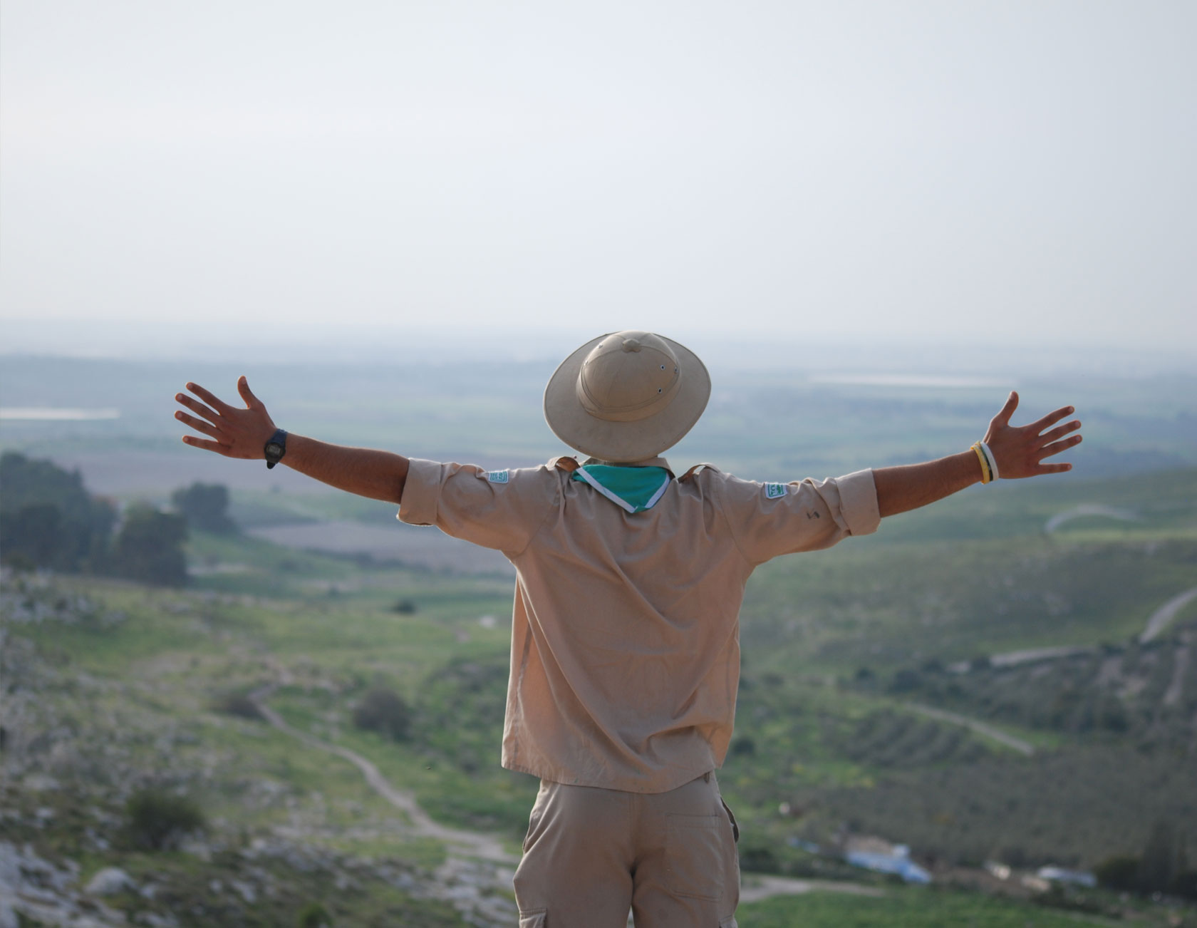 tzofim-young-man-hands-showing-victory